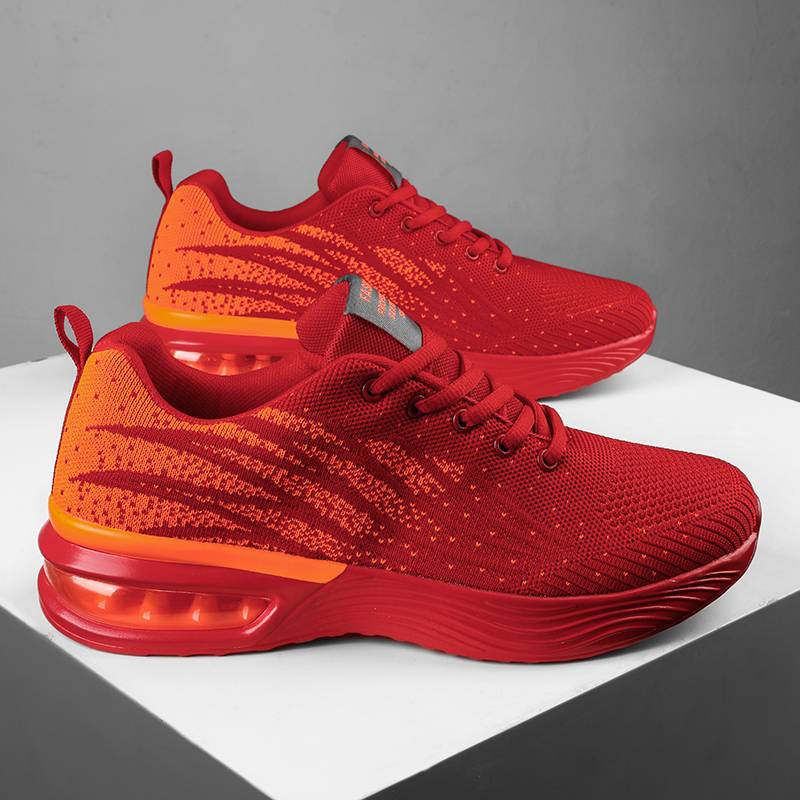 Christine Brewer women's running shoes with breathable knit upper and air cushion sole, designed for comfortable running.