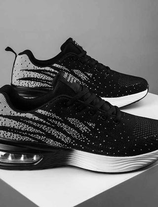Christine Brewer women's running shoes with breathable knit upper and air cushion sole for comfort and support.