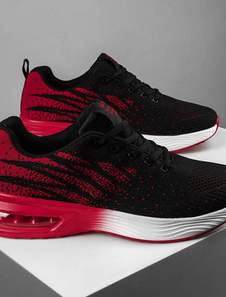 Christine Brewer women's running shoes with breathable knit upper and air cushion sole, designed for comfort and performance.