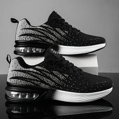 Women's breathable knit running shoes by Christine Brewer with air cushion sole, designed for comfort and performance.