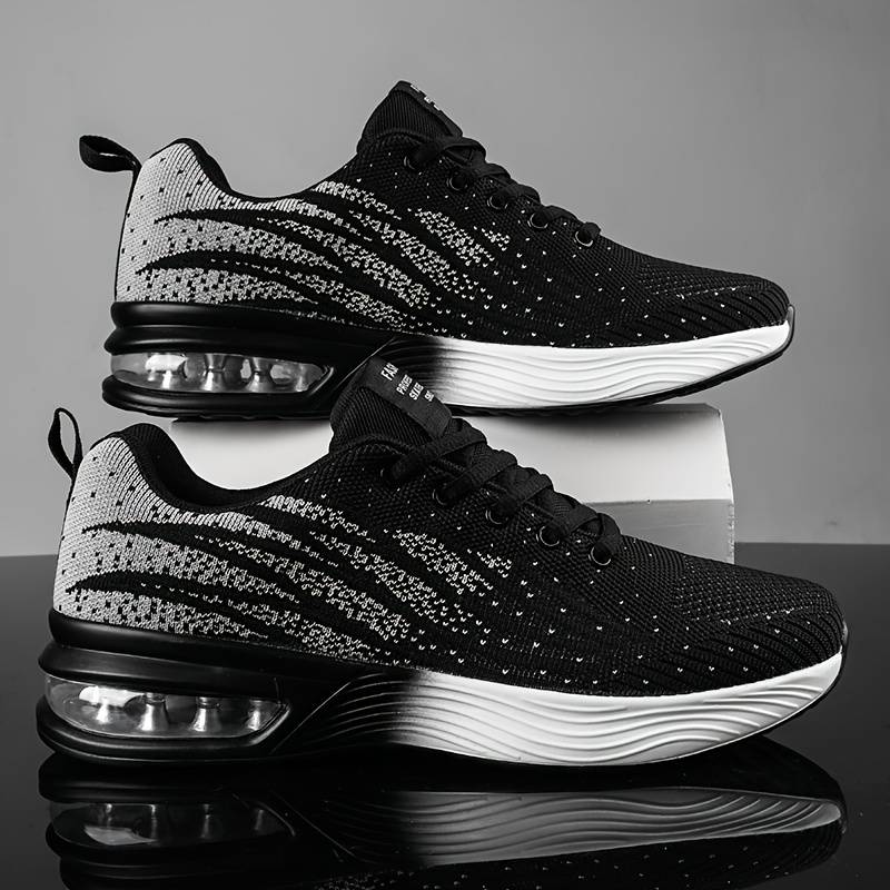 Women's breathable knit running shoes by Christine Brewer with air cushion sole, designed for comfort and performance.