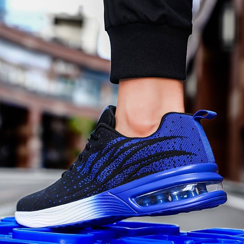Christine Brewer women's running shoes with breathable knit upper and air cushion sole for comfortable support during exercise.