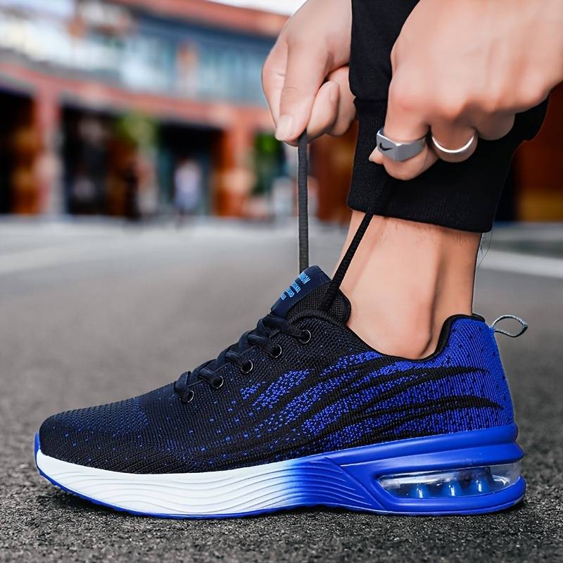Women’s breathable knit running shoes with air cushion support by Christine Brewer, featuring lightweight design and flexible sole.