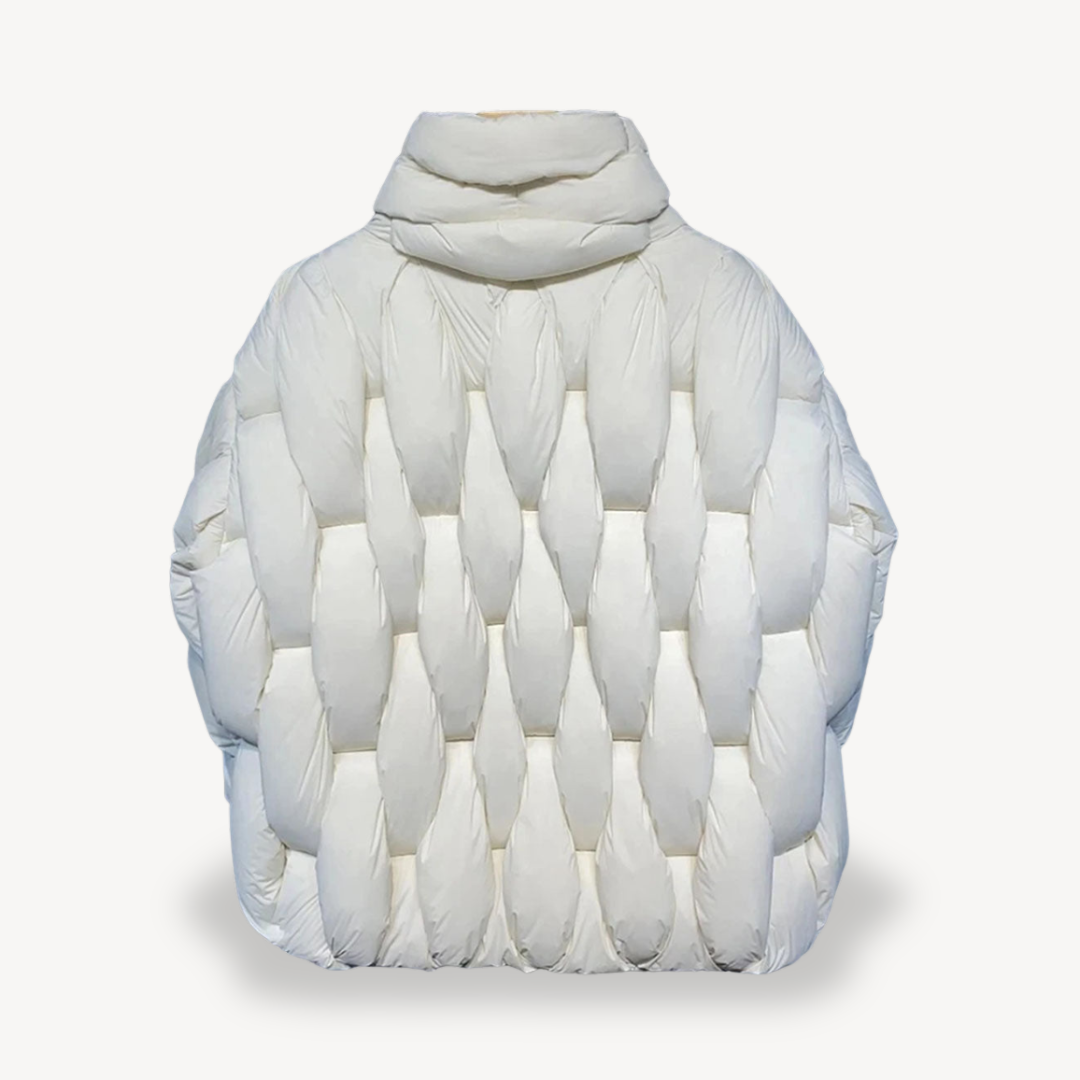 Sage plush puffer jacket for women by Christine Brewer, featuring a cozy, quilted design and a high collar for warmth and style.