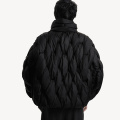 Sage plush puffer jacket for women by Christine Brewer, featuring a cozy, quilted design and a fashionable puffer style.