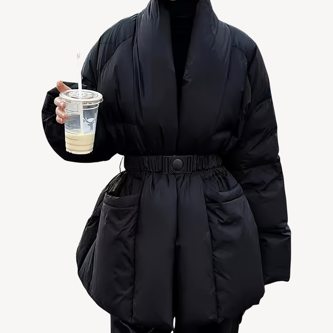 Black Charlotte belted quilted puffer jacket for women by Christine Brewer, featuring a stylish quilted design and belt detail.