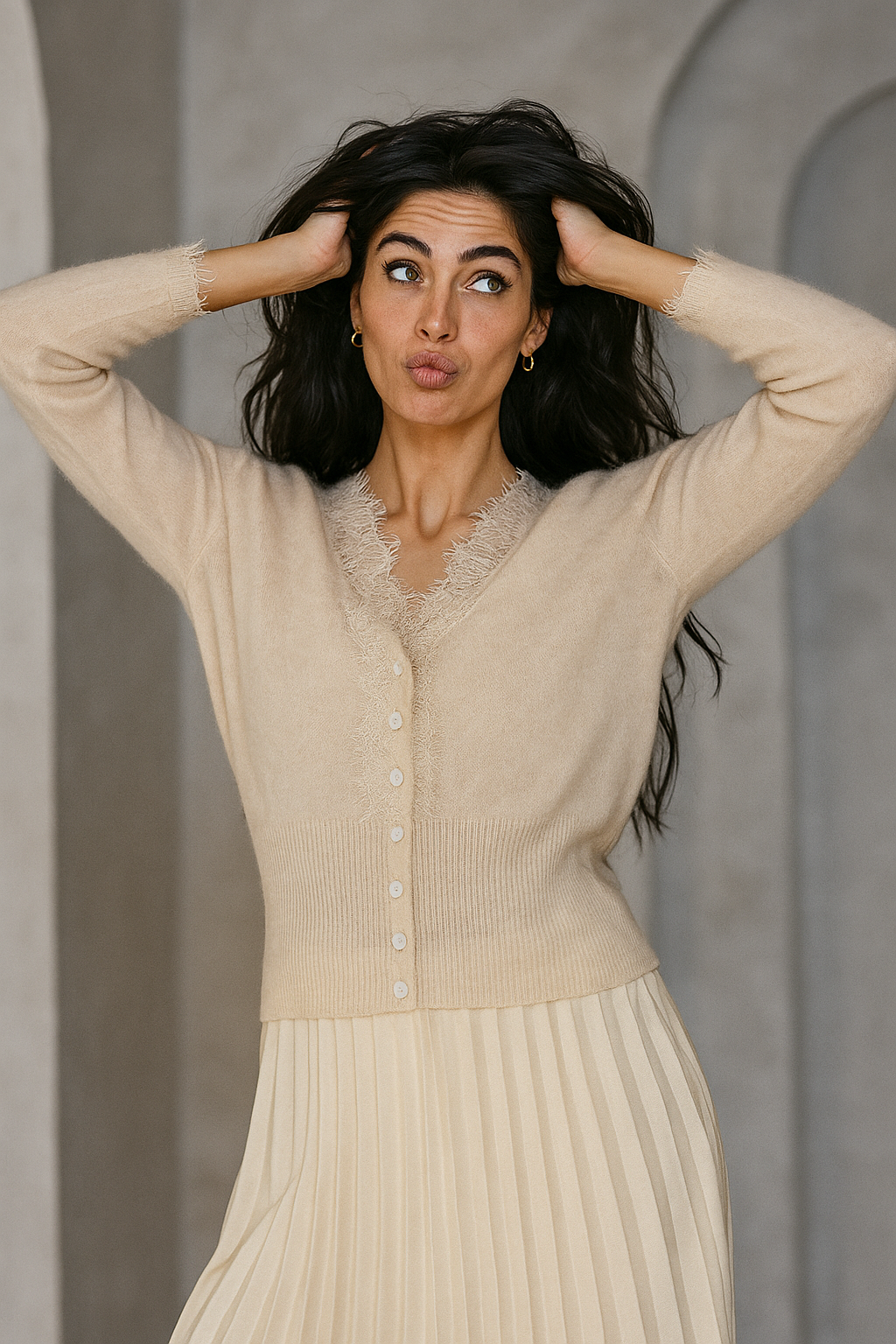 Elsa cashmere cardigan for women by Christine Brewer, soft and cozy knit sweater with a classic design and button closure.