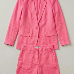 Tailored Penelope blazer for women from Christine Brewer, showcasing a sleek, fitted design in a professional suit style.