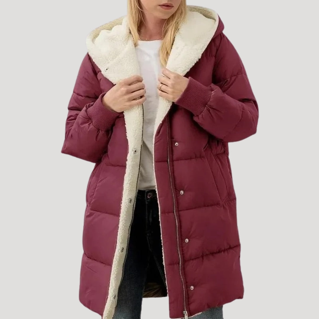 Olivia hooded puffer jacket for women by Christine Brewer, Bordeaux-colored jacket with faux fur-lined hood and quilted design.