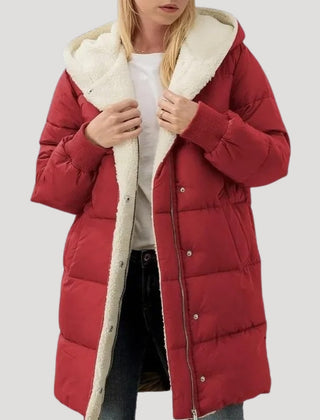 Red Olivia hooded puffer jacket for women by Christine Brewer, featuring a faux fur-lined hood and quilted insulation.