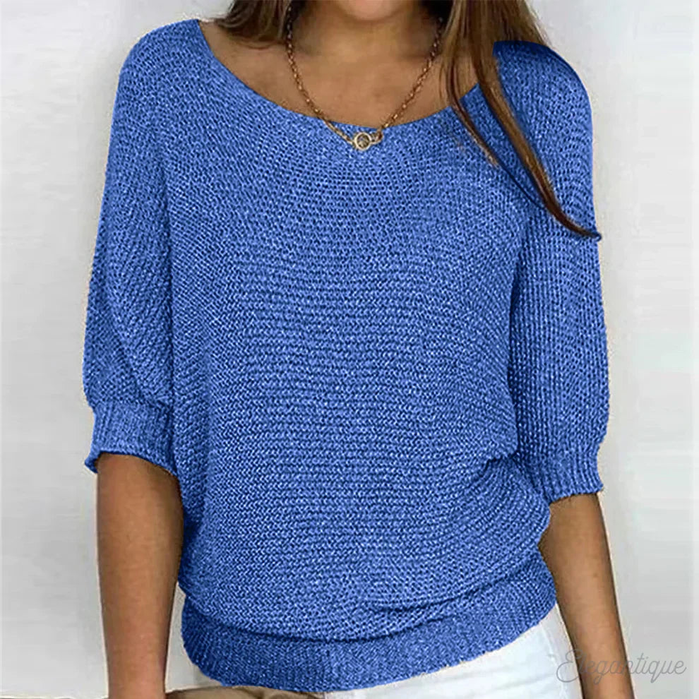 Light beige knit sweater for women by Christine Brewer, featuring a cozy, elegant design with a textured pattern.