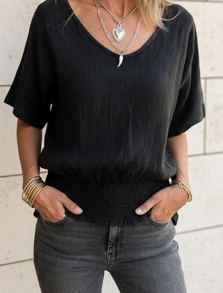 Christine Brewer Ella V-Neck T-Shirt for women, soft fabric, fitted style, in a neutral color, displayed on a hanger.