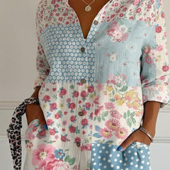 Lily floral graphic blouse for women by Christine Brewer, featuring colorful floral print and lightweight fabric.