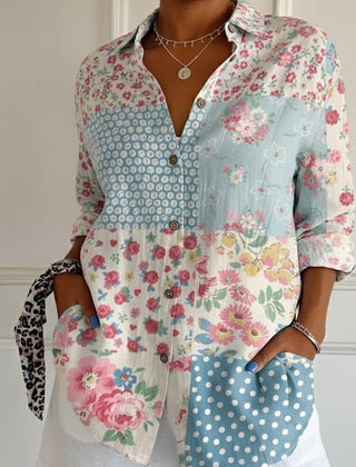 Lily floral graphic blouse for women by Christine Brewer, featuring colorful floral print and lightweight fabric.