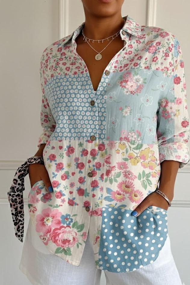 Lily floral graphic blouse for women by Christine Brewer, featuring colorful floral print and lightweight fabric.