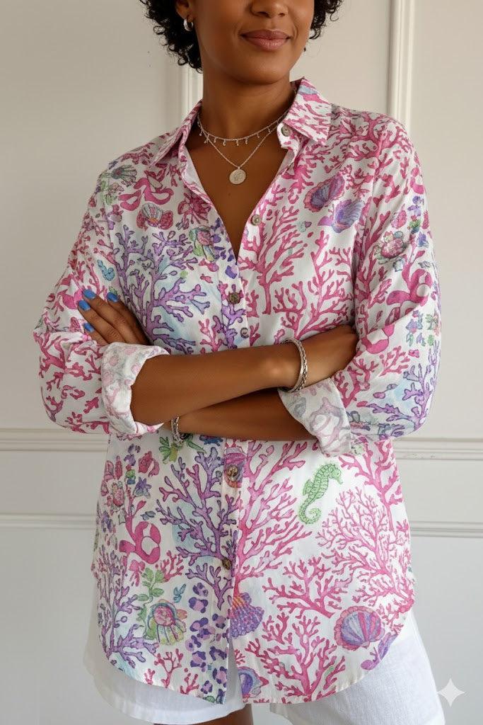 Floral graphic blouse for women by Christine Brewer featuring a vibrant lily and floral print on lightweight fabric.