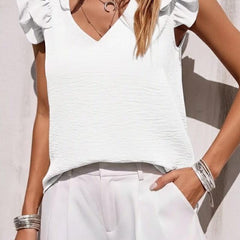 Christine Brewer Grace women's V-neck top, soft fabric, fitted style, in a neutral color, showcasing the elegant neckline.