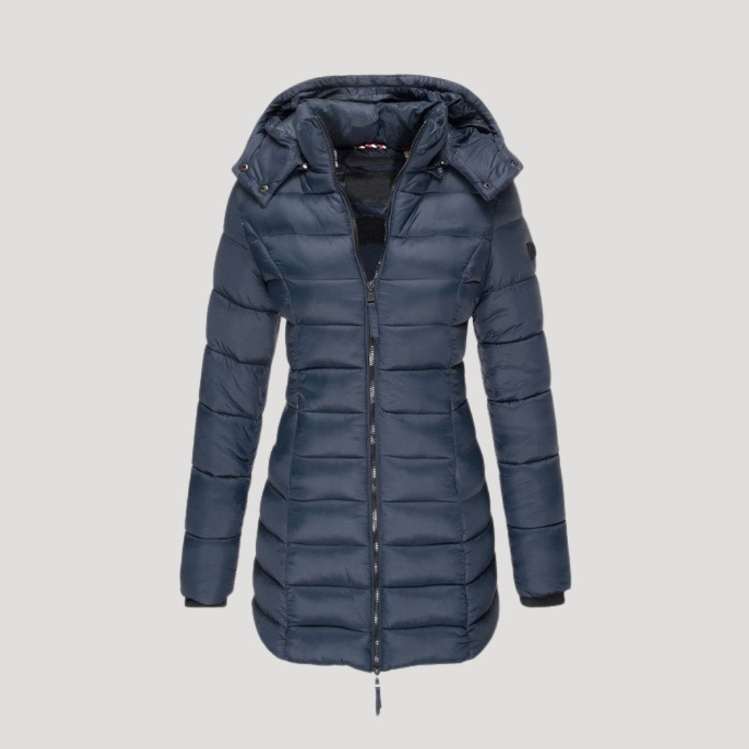 Navy long puffer jacket for women by Christine Brewer, featuring a quilted design and cozy collar, perfect for winter warmth.
