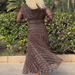 Bohemian patterned V-neck mesh maxi dress by Christine Brewer, featuring flowing fabric and casual elegance for wedding or special occasions.
