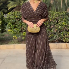 Bohemian patterned V-neck mesh maxi dress by Christine Brewer featuring a casual, flowing design suitable for weddings and events.