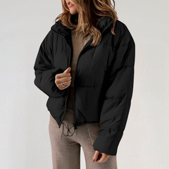 Black Emma high collar puffer jacket for women by Christine Brewer, featuring a stylish, insulated design with a high neckline.