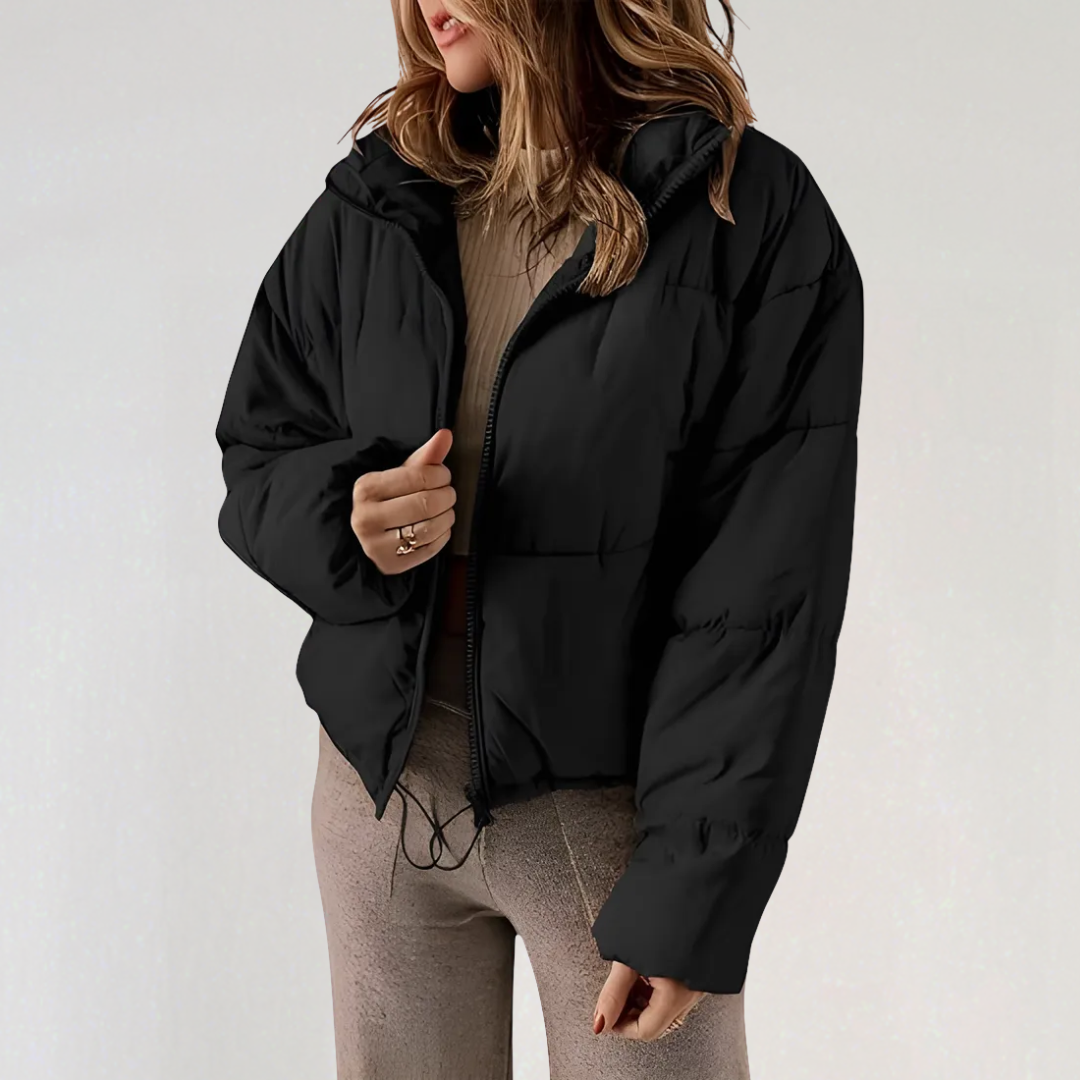 Black Emma high collar puffer jacket for women by Christine Brewer, featuring a stylish, insulated design with a high neckline.
