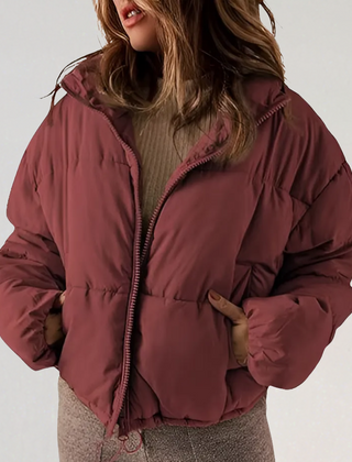 Dark red Emma high collar puffer jacket for women by Christine Brewer, featuring a stylish and warm winter jacket design.