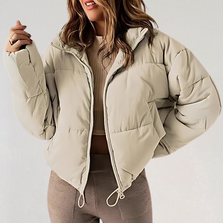 Khaki Emma high collar puffer jacket for women by Christine Brewer, featuring a stylish warm winter jacket with a high-neck design.