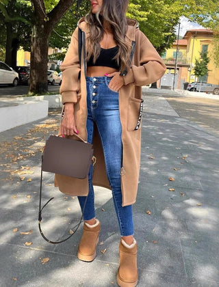 Women wearing the Christine Brewer Isla oversized hooded long coat with zip-up fleece outerwear, showcasing its relaxed fit and cozy style.