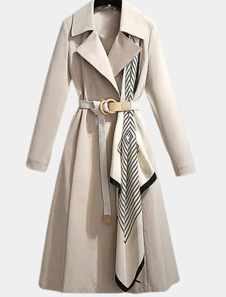 Women’s beige belted midi trench coat by Christine Brewer, featuring classic design and waist belt, displayed on a model.