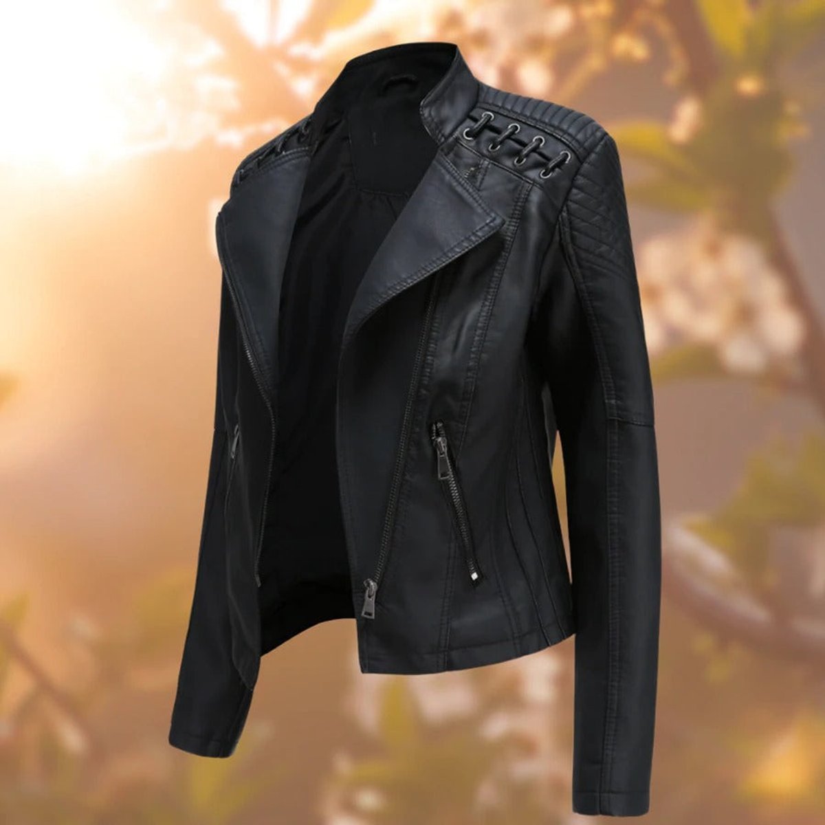 Women’s biker-style zip-up faux leather jacket by Christine Brewer, showing the sleek black design and silver zipper details.