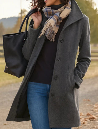 Women's Phoebe classic mid-length button-up coat by Christine Brewer, featuring a button-front design and tailored fit.