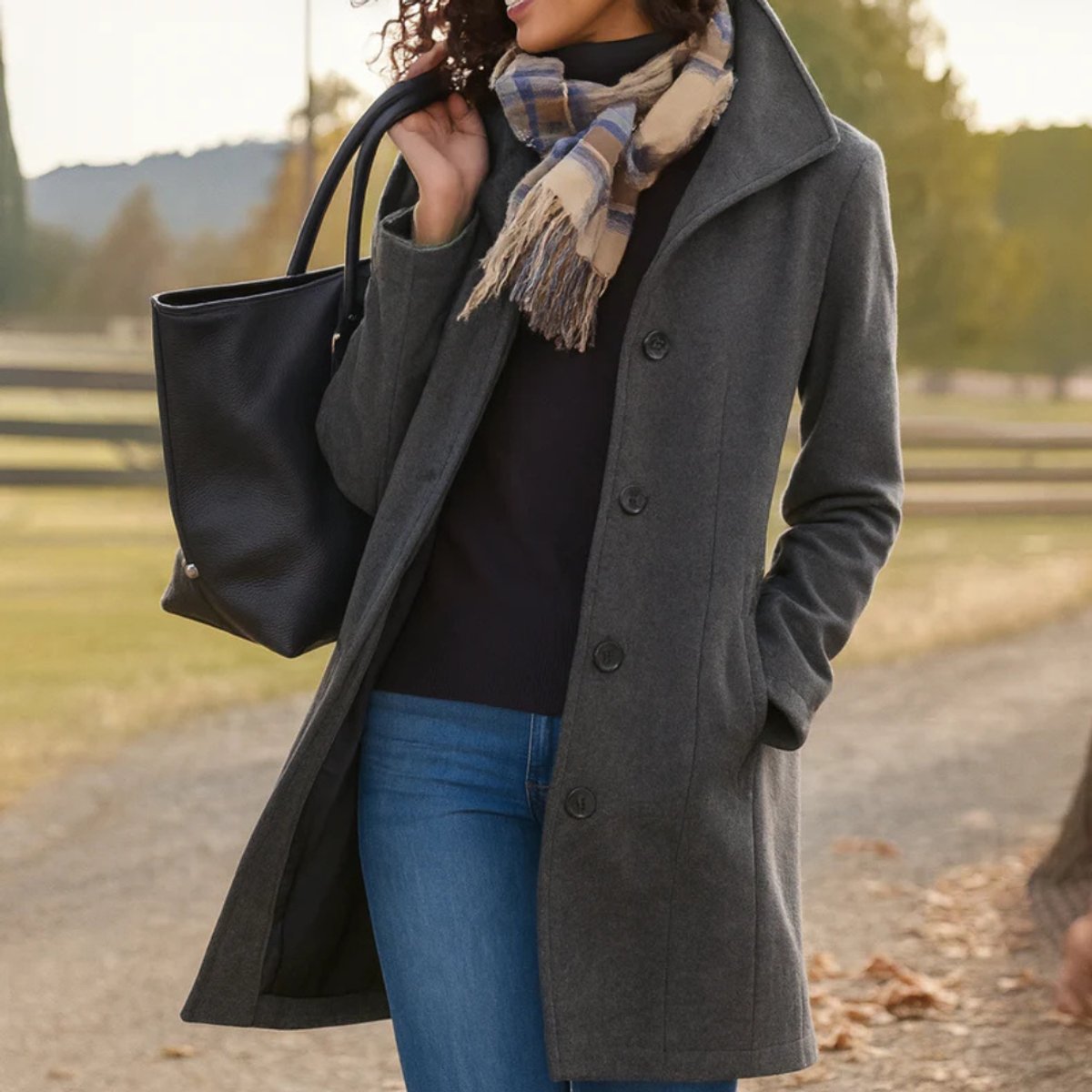 Women's Phoebe classic mid-length button-up coat by Christine Brewer, featuring a button-front design and tailored fit.