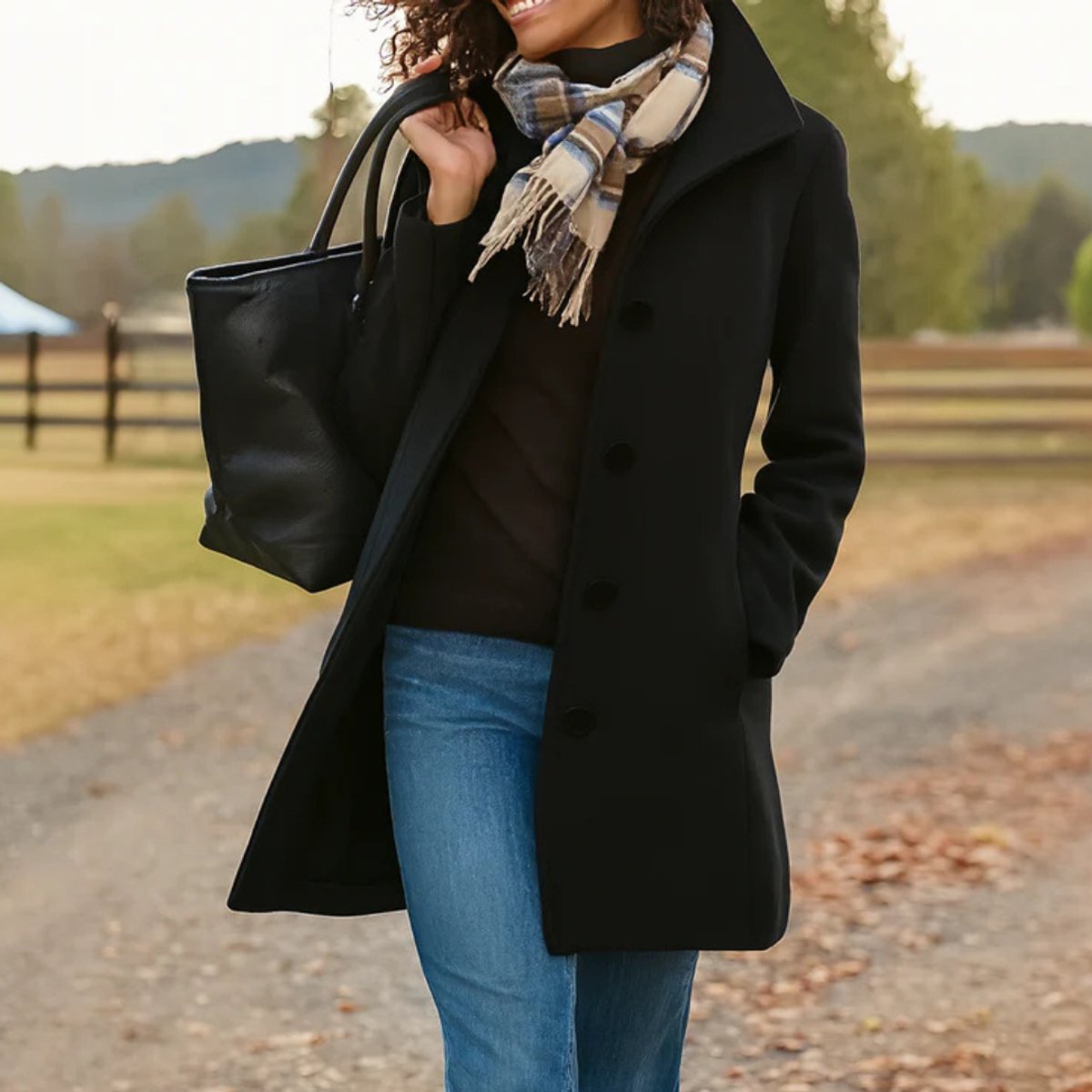 Women's classic mid-length button-up coat by Christine Brewer, featuring a button-front design and stylish, versatile outerwear.