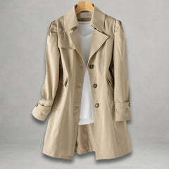 Women’s classic fit single-breasted trench coat with notch lapel, by Christine Brewer, shown on a model.