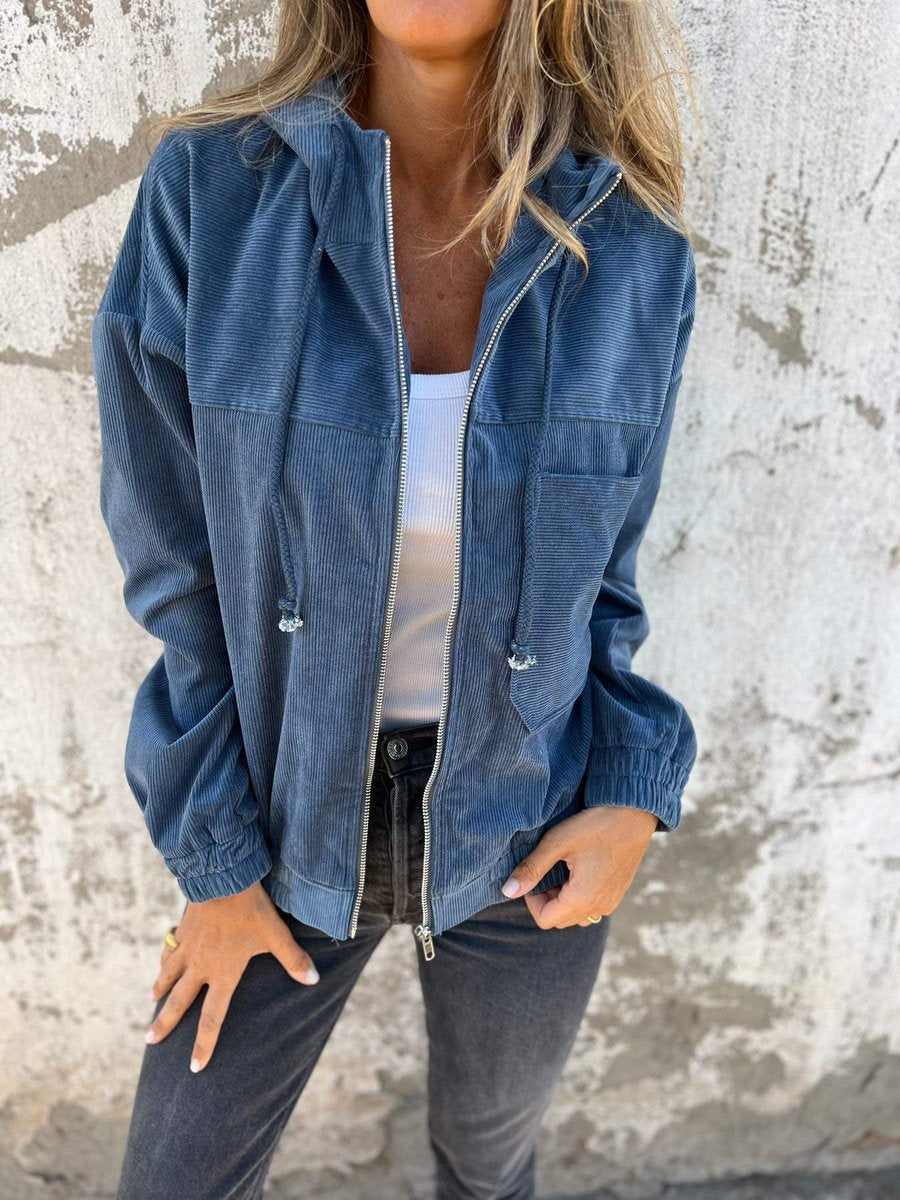 Women’s oversized corduroy hooded zip-up jacket by Christine Brewer, casual style with a front zipper and hood.