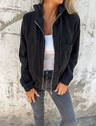 Scarlett women's oversized corduroy hooded zip-up quilted jacket by Christine Brewer, featuring a cozy, stylish design.