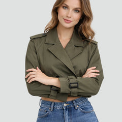 Women's cropped double-breasted belted trench coat by Christine Brewer, showcasing a stylish beige trench jacket with belt and collar.
