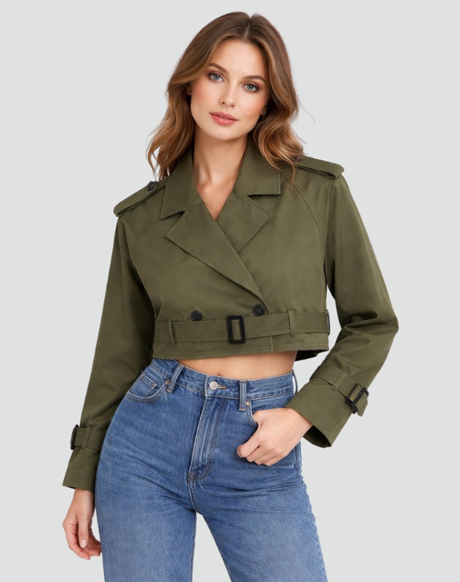Women's cropped double-breasted belted trench coat by Christine Brewer, shown in beige with classic lapels and waist belt.
