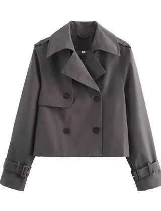 Women's Sienna cropped trench coat by Christine Brewer with double-breasted design and buckle cuff details.