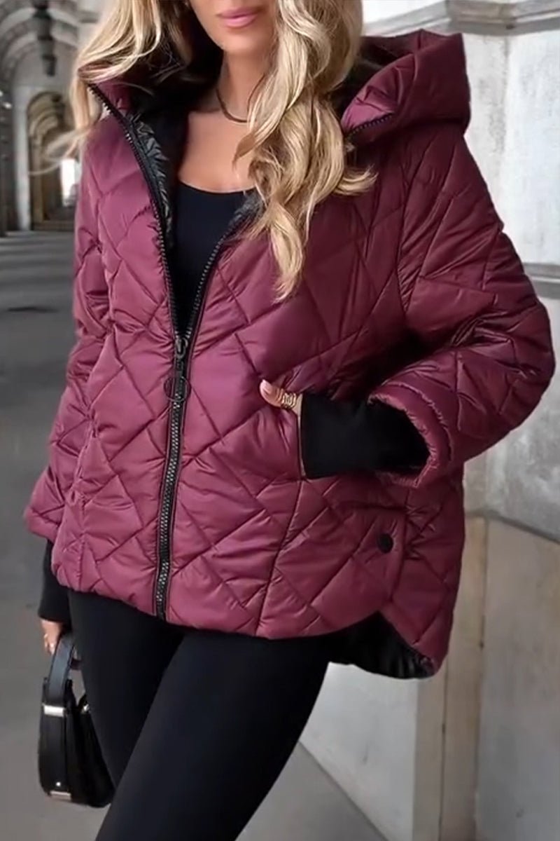 Women's diamond quilted hooded puffer jacket by Christine Brewer, featuring a zip-up front and cozy quilted design.