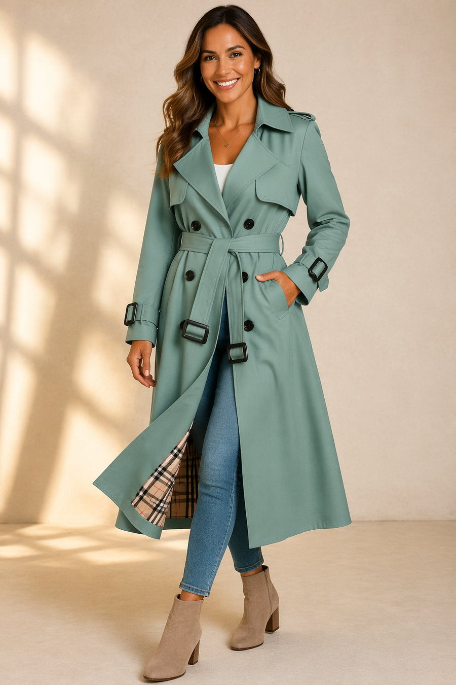 Emily women's double-breasted belted long trench coat by Christine Brewer, shown in a stylish beige color with classic lapels.
