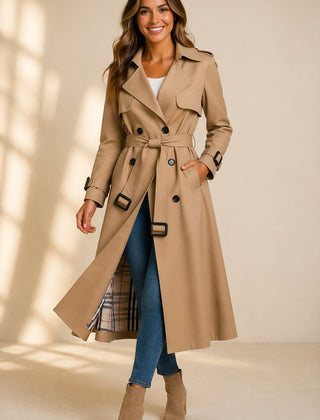 Emily women's double-breasted belted long trench coat by Christine Brewer, shown in a stylish beige fabric with a classic silhouette.