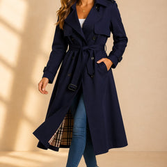 Emily women's double-breasted belted long trench coat by Christine Brewer, shown in a stylish beige with classic lapel collar.