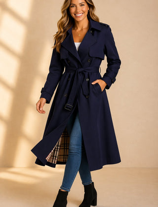 Emily women's double-breasted belted long trench coat by Christine Brewer, shown in a stylish beige with classic lapel collar.