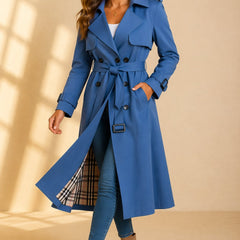Emily women's double-breasted belted long trench coat by Christine Brewer, shown in a stylish beige color with classic lapels.