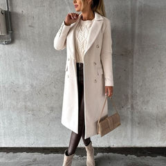 Women's Sienna double-breasted long-line polyester coat, midi-length, stylish outerwear by Christine Brewer, shown on a model.