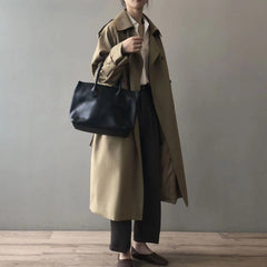 Christine Brewer Sophie women's double-breasted water-repellent long trench coat, shown in beige with a belt and classic collar.