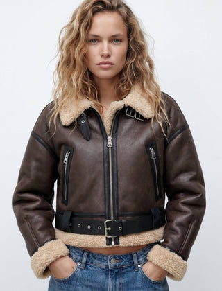 Women's double-sided shearling bomber jacket by Christine Brewer, featuring cozy shearling fabric and stylish bomber silhouette.