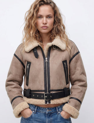 Women’s double-sided shearling bomber jacket by Christine Brewer, featuring plush shearling fabric and a stylish bomber design.